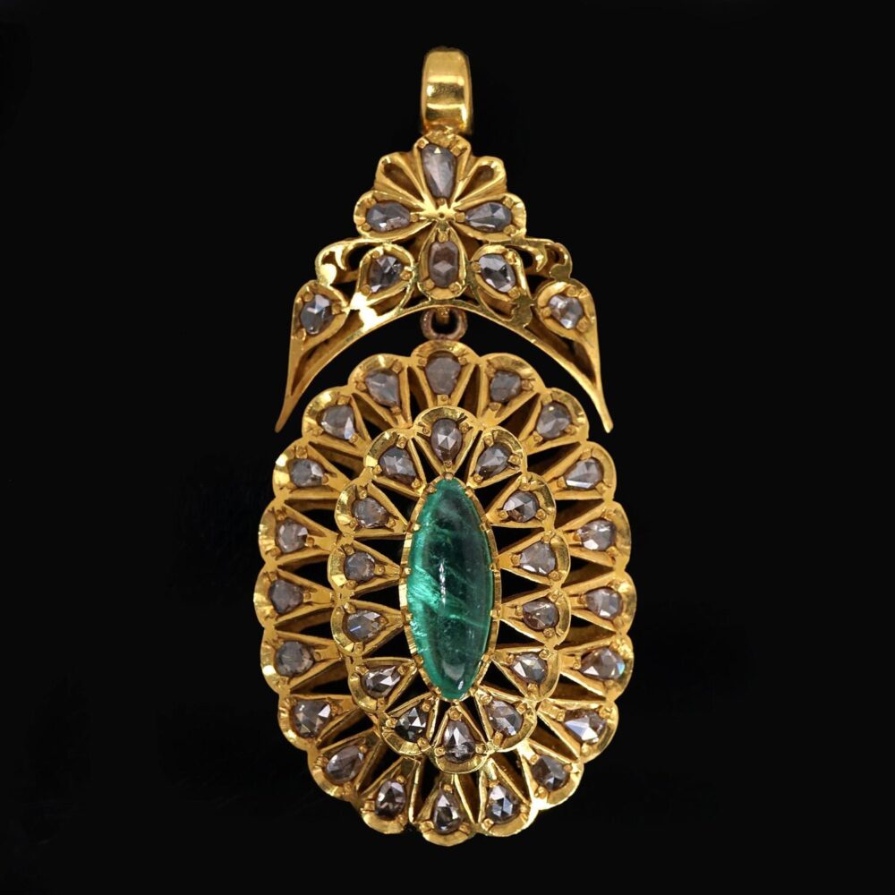 Vintage 9ky gold brooch with emerald stone