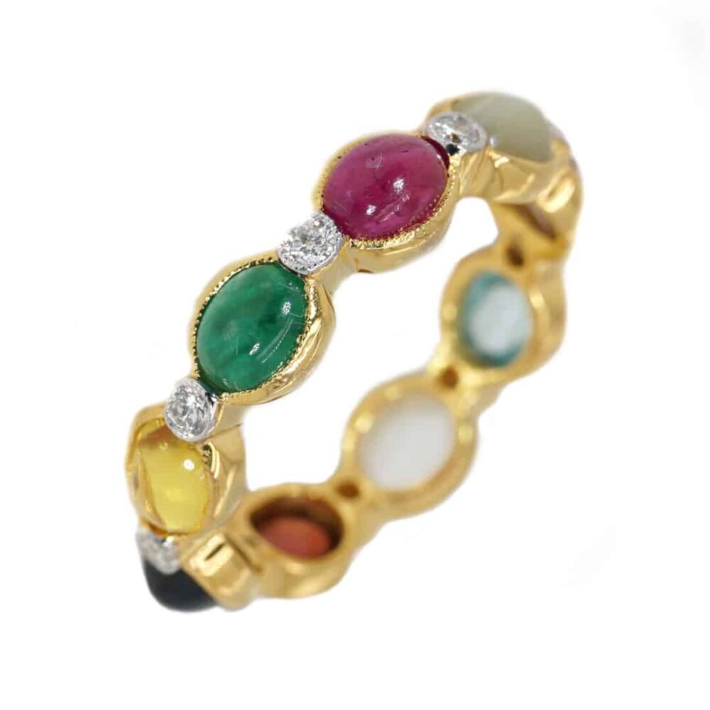 Navaratana 18ky gold ring with 8 color stones and diamonds